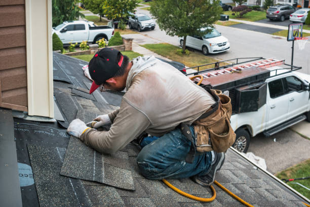 Professional Flat Roof Repair technician working in Preston, TX